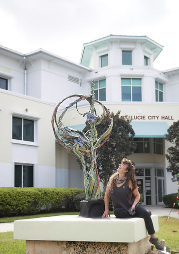 7 foot crane lands in Port St Lucie. Artist Lee Bell of Black Lily Studio Installs at city Hall
