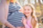 Houston maternity flowing white dress dramatic pose field golden hour