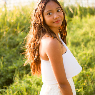 senior photo session in park with field 