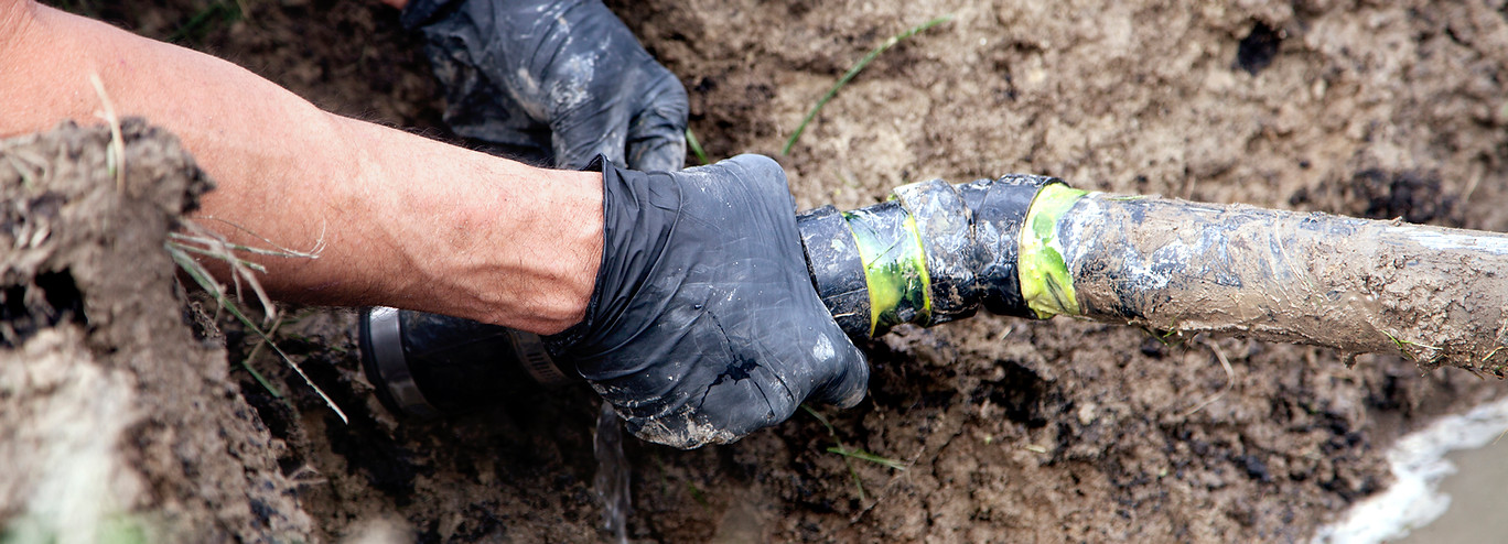 Man Holding Pipe