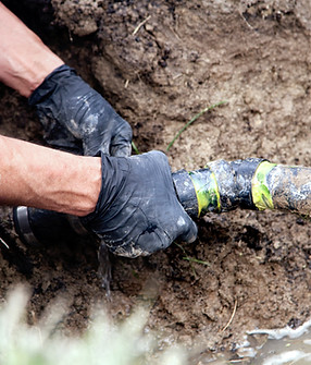 Man Holding Pipe