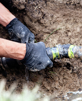 Man Holding Pipe