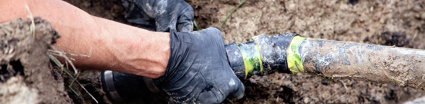 Man Holding Pipe