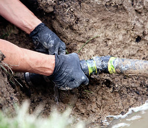 Man Holding Pipe