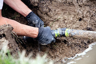 Man Holding Pipe