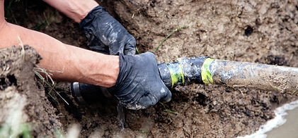 Man Holding Pipe