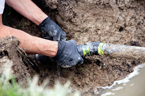 Man Holding Pipe