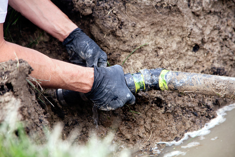 Man Holding Pipe