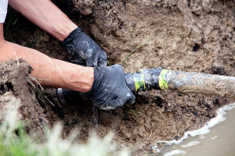 Man Holding Pipe