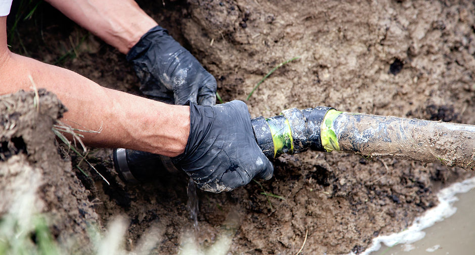 Man Holding Pipe