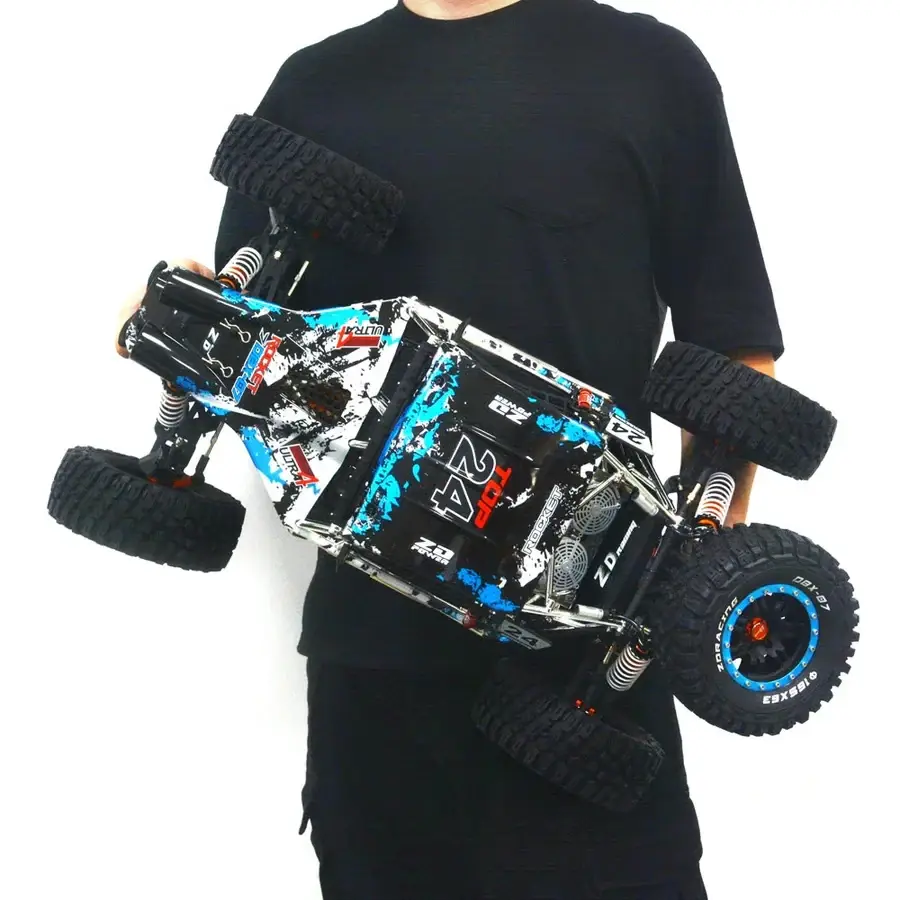 Thumbnail: Man holding ZLL Beast Max SG316 1:16 Scale Brushless RC Truck, black attire, white background