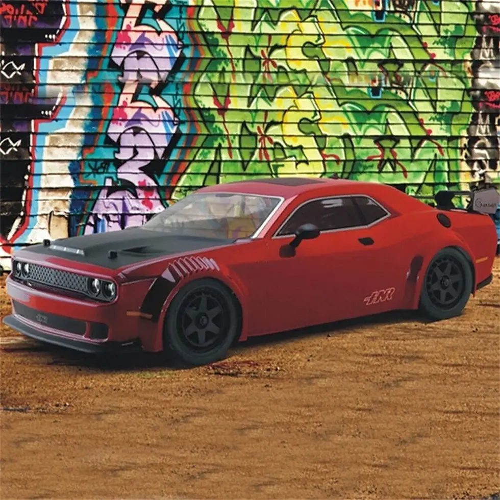 Miniatura: Red Dodge Challenger sports car on a graffiti background. Prestige Performance Rc - #1 Hobby Shop