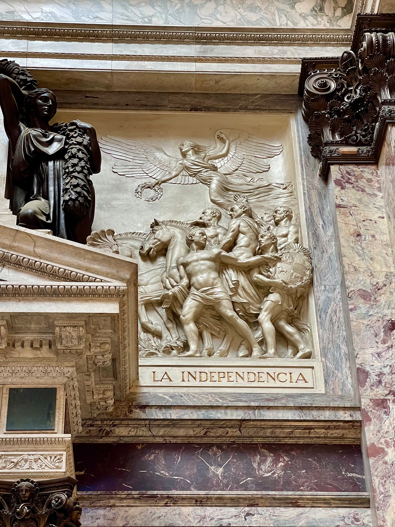 Sculptural relief depicting independence