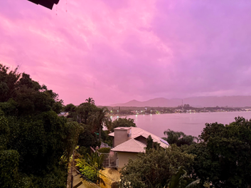 after a rain soaked Saturday, the sky lit up pink at sunset