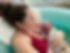 Mother and infant in birthing pool, looking at each other in the first few minutes after birth
