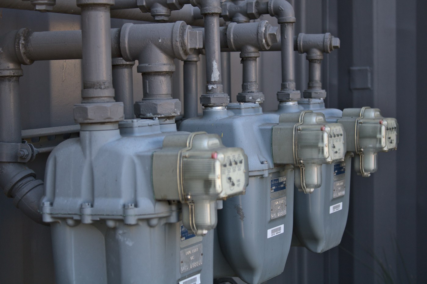 Utility meters and service piping in a commercial building