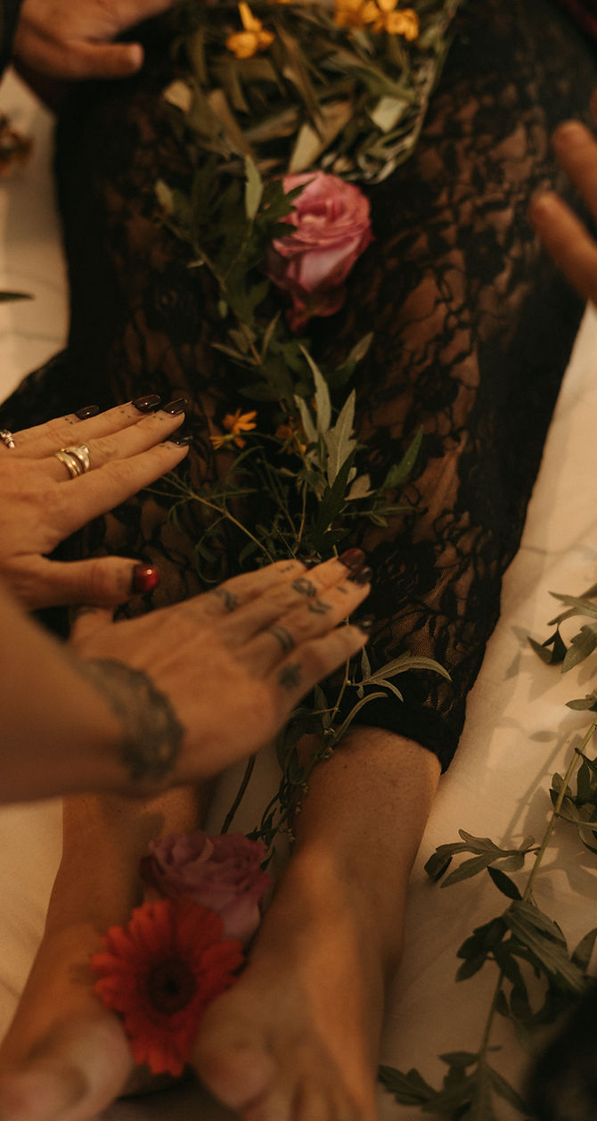 hands on me laying kels hands.jpg