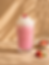 Strawberry Vanilla Shake with whipped cream and berries.
