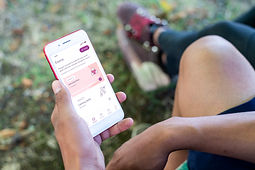 teen holding app.jpg