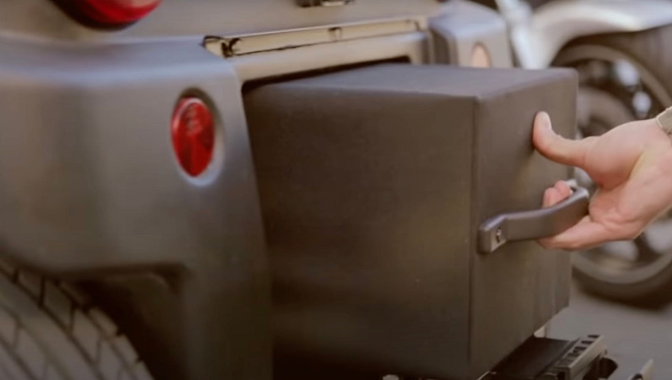 A user swapping the Biro battery out.