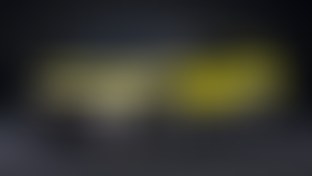 A Renault 5 Turbo 3E hot hatch on full display with a black background