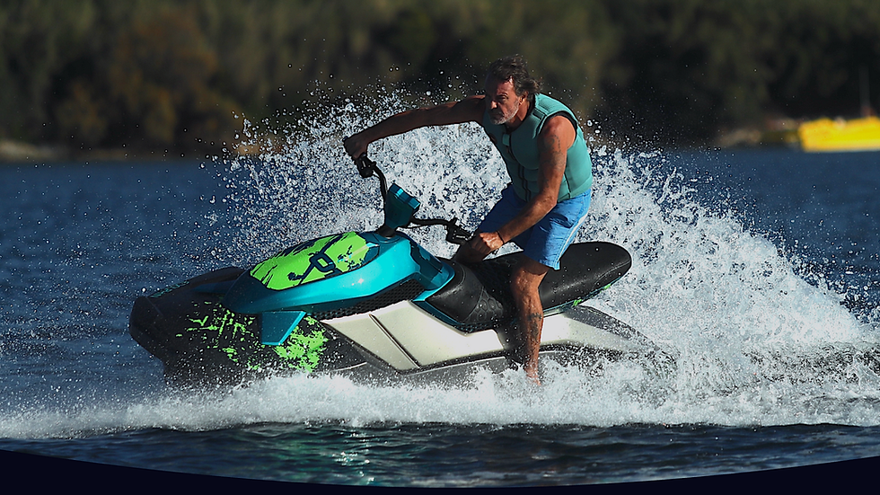 A rider on his E-Dolphin S300 electric watercraft in open water