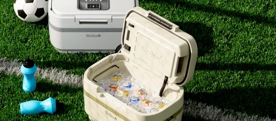 Two Solo Stove Windchill coolers on display at a soccer field
