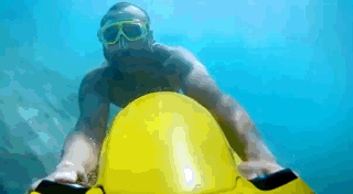 A visual of someone riding the Seabob underwater. 
