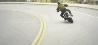 A rider out on the open road with their Ryvid Anthem motorcycle.