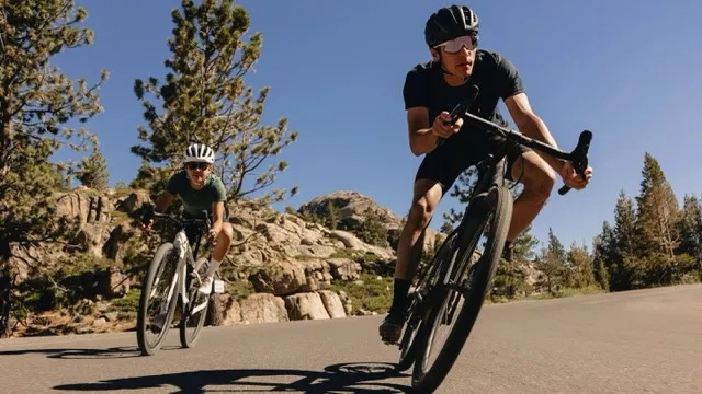 Two cruising Turbo Creo 2 Comp E5 electric bike riders taking a nice turn.