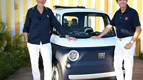 A view of the two founders near their Fiat Topolino Vilebrequin electric microcar