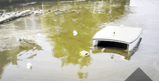 The WasteShark in motion as it is gobbling up water debris left behind by litterbugs.