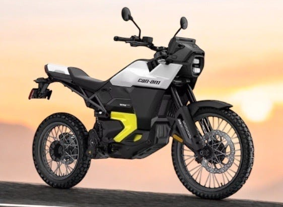 A Can-Am Origin electric motorcycle on full display with a sunset in the background
