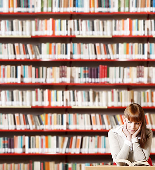 Girl reading in library