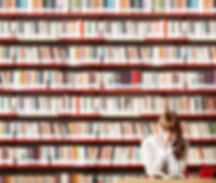 Girl reading in library