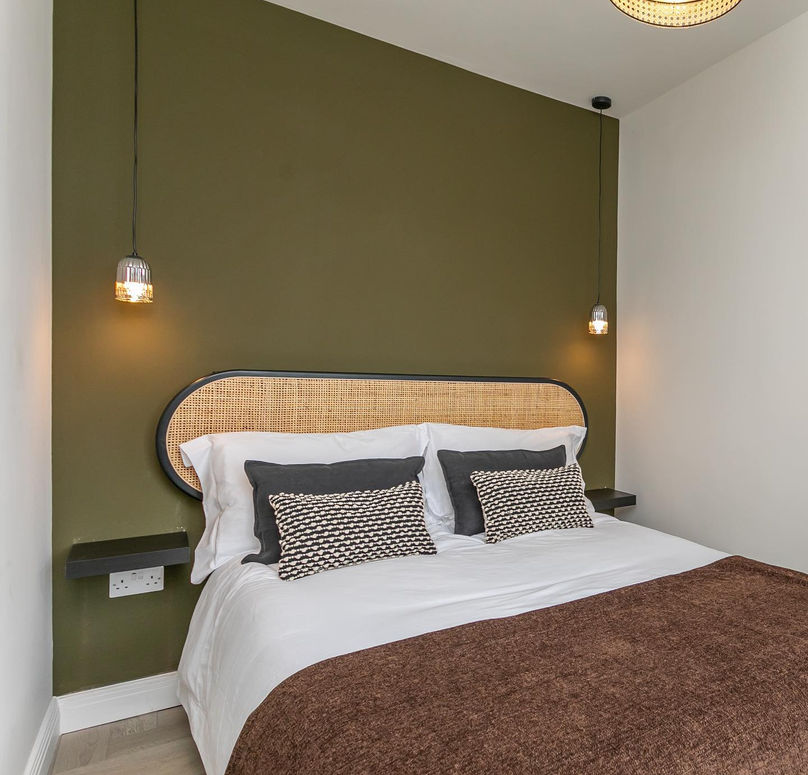 bedroom with lights on
