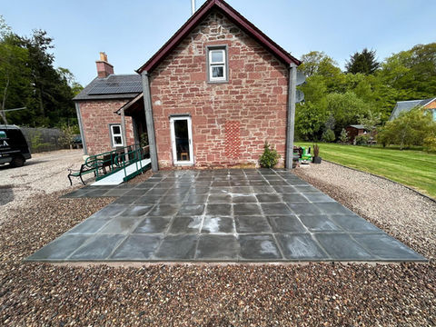 back patio of a brick house 