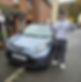 student driver near a car