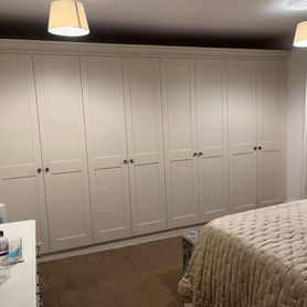 fitted wardrobe, and rear of bed