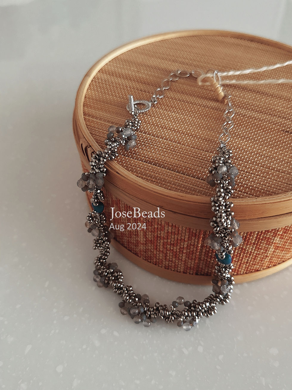 Thumbnail: Single spiral stitch genstone necklace (Stitch 2410)