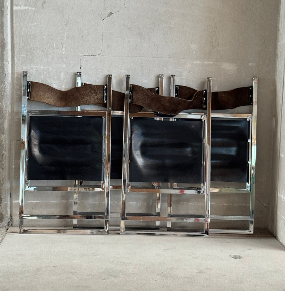 Alternative view of the Italian-designed folding chairs compactly stored together