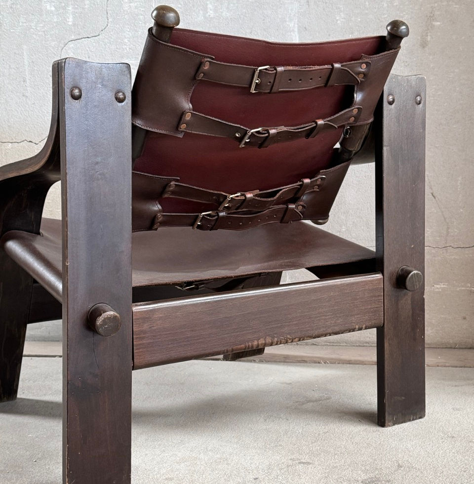 Rear view of the second armchair highlighting the 360-degree rotating backrest structure
