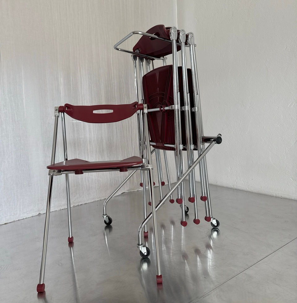 Space-saving storage configuration with chairs loaded on the original stand