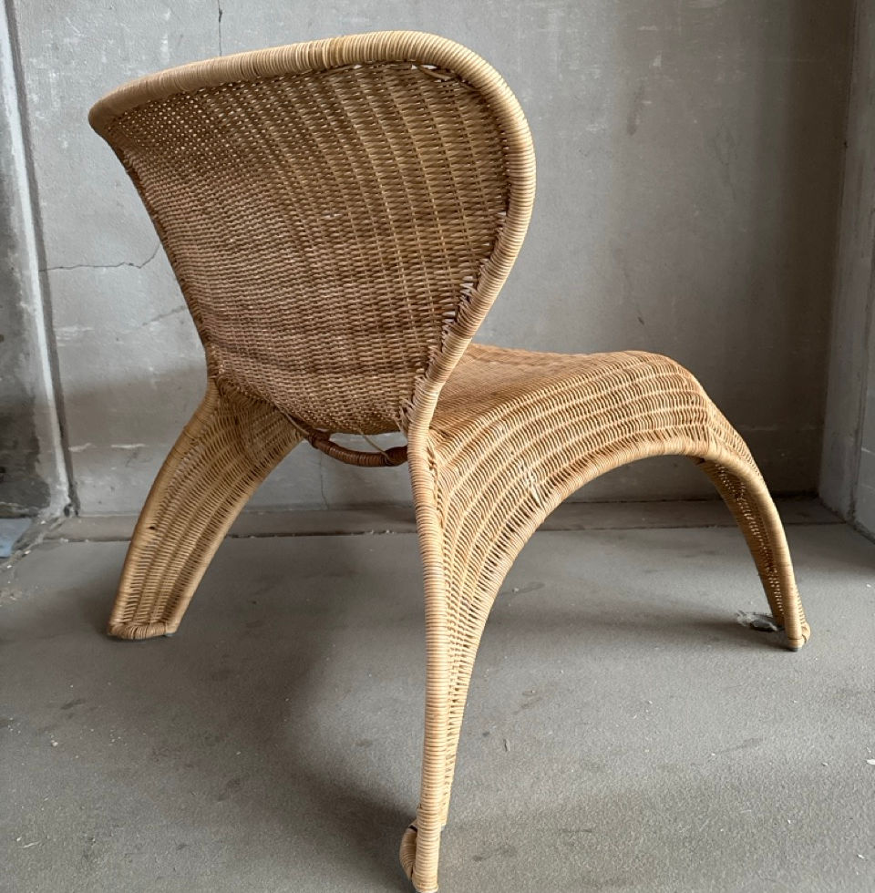 Side and rear profile showing the minimalist construction of the Gulte chair