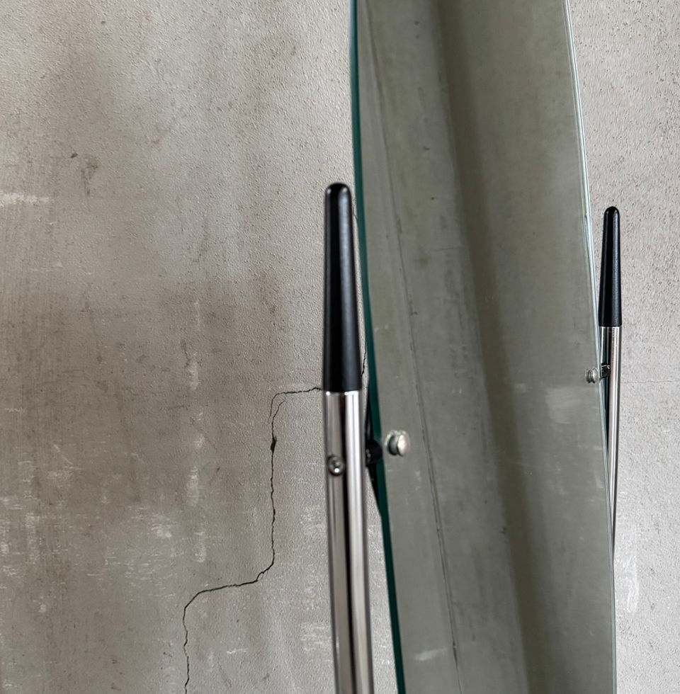 Detailed view of the sleek metal frame and minimalist proportions