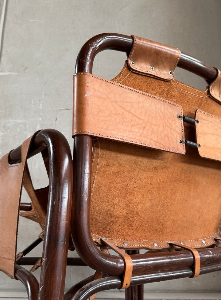 Rear angle view highlighting the Italian mid-century brutalist design and cane structure
