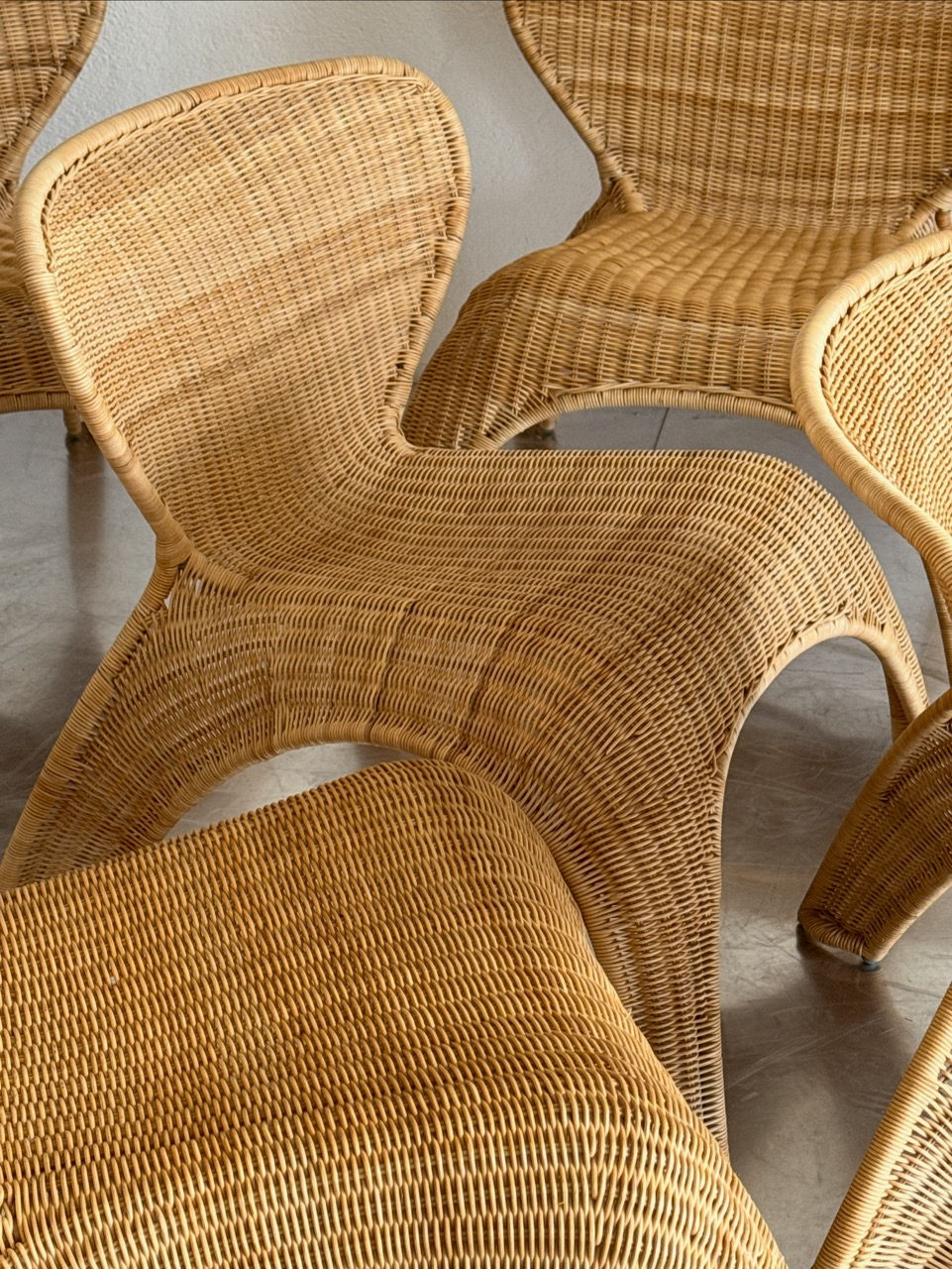 Set of 5 rare vintage IKEA Gulte woven lounge chairs in a group