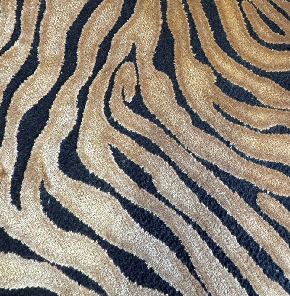Top view showing the distinctive zebra or tiger stripe pattern on the seat
