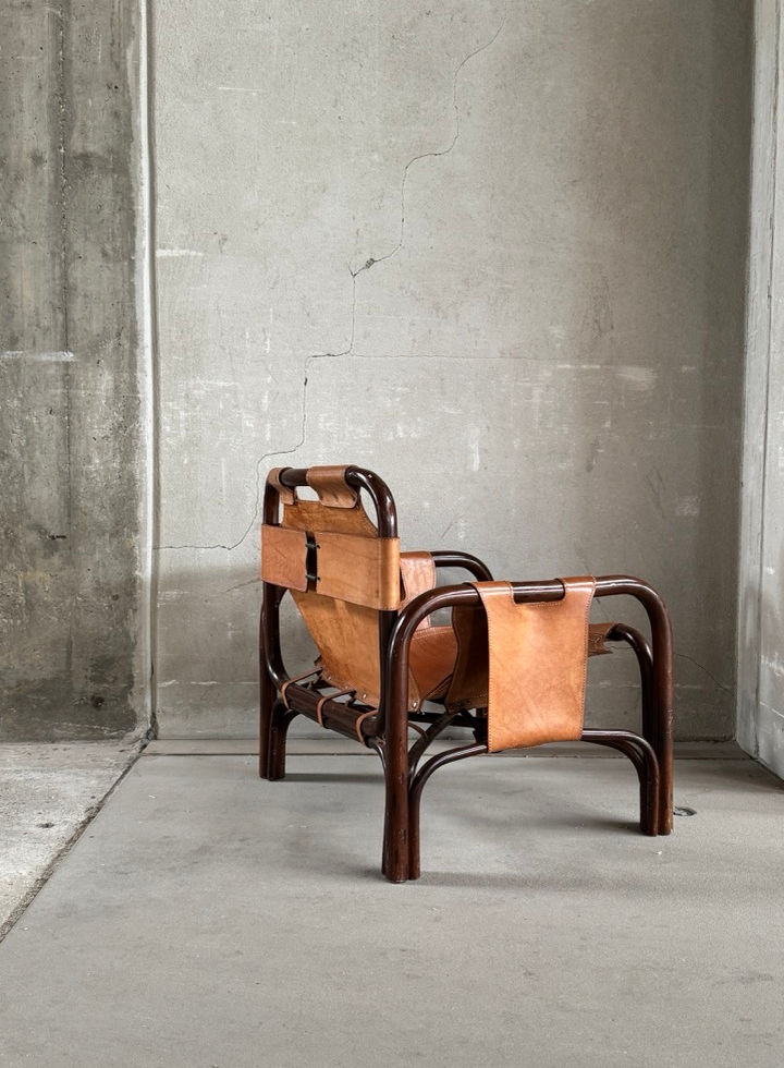 Full rear view of the Italian brutalist Safari chair by Tito Agnoli for Bonacina