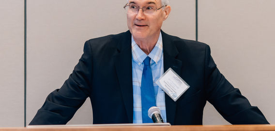 Gentleman presenting to OBHPN members at annual meeting